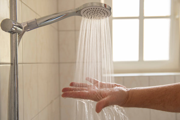 How to Clean Shower Head to Improve Water Pressure and Remove Buildup - Genzon Water